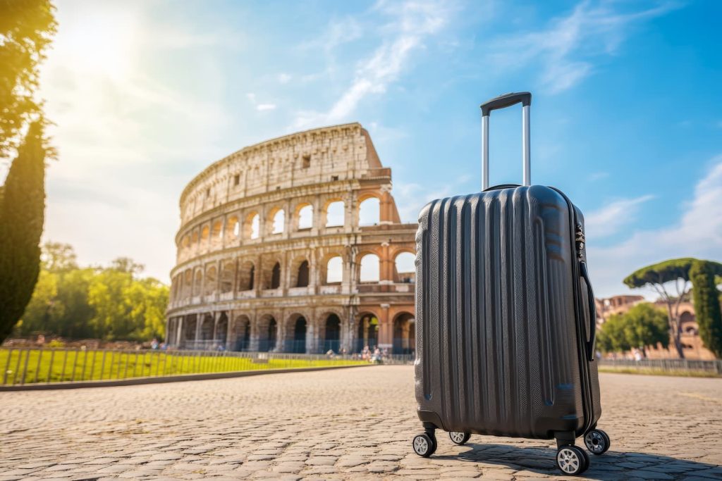 Suitcase with Colosseum in the background